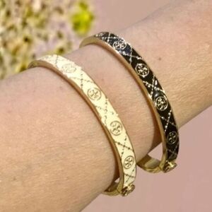 Tory Burch Gold and Black Bracelets